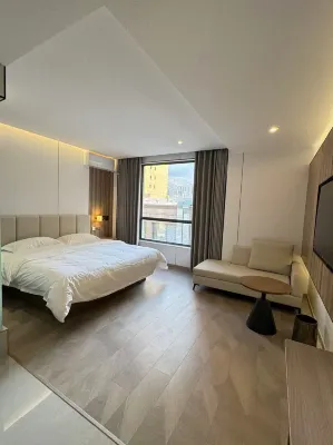 Yuanmu Homestay Hotel (Longnan Station Longnan First People's Hospital)