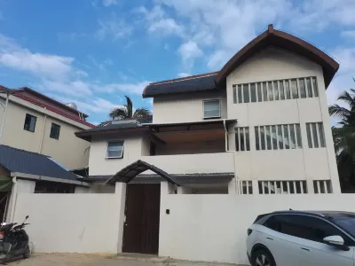 Baoting Sandao Li Family One Stay Homestay Hotels in Yanoda Rainforest Cultural Tourism Zone/Binglanggu