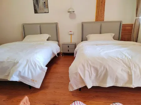 Haba Xingfu Xiaoyuan (Haba Snow Mountain) Отели рядом с достопримечательностью «Habacun»