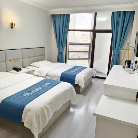 Home Huayi Hotel (Fuyang Railway Station)