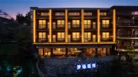 Mengluo Xinghe Hotel