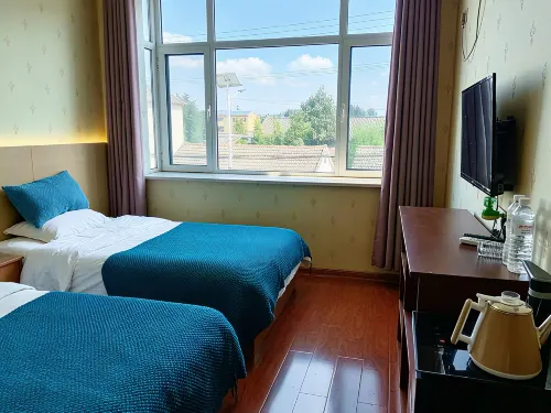 Weishan Xinyi Homestay - parking