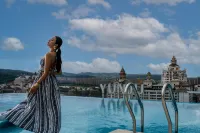 Huiting Yunju Hotel (Xishuangbanna Jinghong Gaozhuang West Shuangjing Xingguang Night Market Branch) - piscina