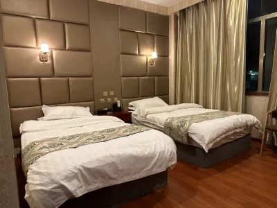 Jiangda Yulong Hotel Hôtels à : Jomda