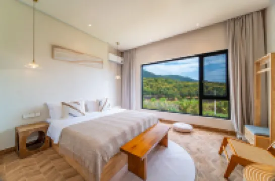 Wanning Riyuewan Flower Romantic Homestay