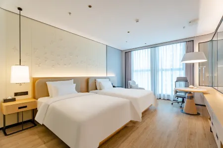 Xuzhou Earl Family Hotel Отели рядом с достопримечательностью «Jiangsu Union Technical Institute Xuzhou Finance and Economics Branch»