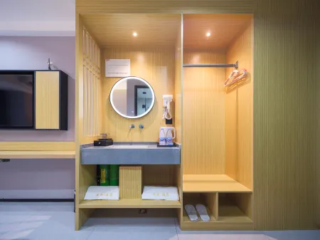 Yunmu Hotel (Zhengzhou Zhongyuan Wanda Poly Hearty Hotel) Отели рядом с достопримечательностью «Zhengzhou Botanical Garden»