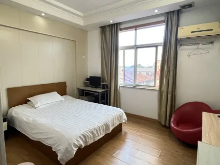 Z+ Xilaideng Hotel (Danyang) Отели рядом с достопримечательностью «Bailong Temple»