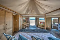 Kingfisher Retreat by Sharjah Collection