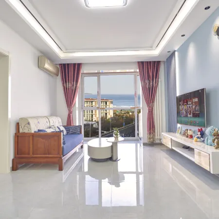 Qingdao Qinhai Life First Line Seaview Holiday Apartment Отели рядом с достопримечательностью «Пляж Голден-Бич»