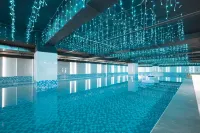 Microtel by Wyndham Xishuangbanna Mengle - ที่มีสระว่ายน้ำ