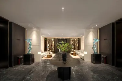 Qiqihar Yufeng Hotel (Qiqihar Railway Station) Отели рядом с достопримечательностью «Кизихарский университет (Западный Кампанией)»