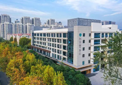 Happy Inn Hotel (Xuchang Gaotie Dongzhan) Hotel in zona Xuchang University