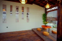 Maitreya Huxi Man Hot Spring Homestay (Huquan Water Town Tourist Resort Scenic Area Branch) Các khách sạn ở Mile