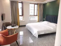 Yixin Apartment Hotel - ห้องครัว
