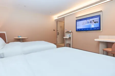 HanTing Hotel (Hegang Railway Station Jinguang Building) Отели рядом с достопримечательностью «Zhenxing Square»