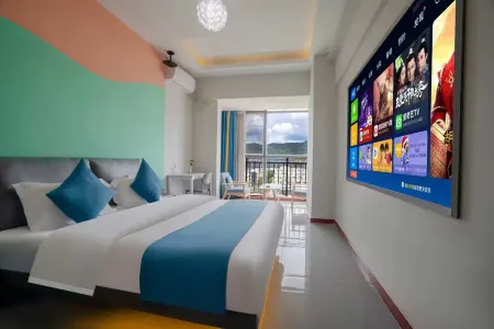 Huameng Hotel Отели рядом с достопримечательностью «Kunming University of Science and Technology Chenggong Campus Library»