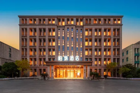 Baizhu Hotel (Zhangjiagang Jinfeng Branch) Отели рядом с достопримечательностью «Zhangjiagang Campus， the City Vocational College of Jiangsu (Binjiang Avenue)»