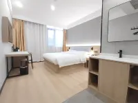 Home UP Huayi Selected Hotel (Bayiji Town Branch, Pizhou, Xuzhou) - 2-Star