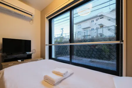 Shinjuku QUALIA PLACE House Отели рядом со станцией Рока-Коэн