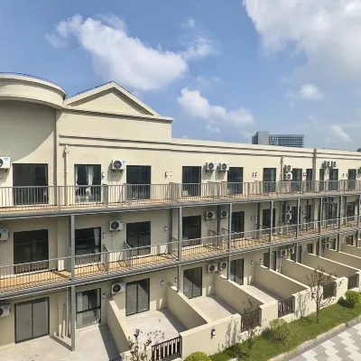 露美家花園式酒店公寓（鎮北路店） 鄰近曹路的酒店