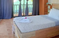 Nalusuan Island Resort and Marine Sanctuary Hotels near Lava Island