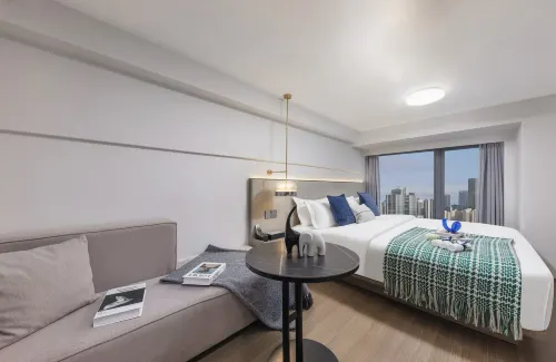 KAERMAN City View Residence (Guangzhou Huadiwan Subway Station) - Homestays