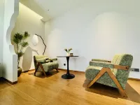 Miyou Smart Homestay (Xingyi Wanfenglin Airport South Railway Station)