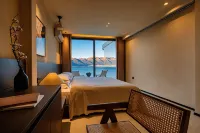 DaLi Jiuyu · Seaside and Mountain View at Dusk · Courtyard Vacation Boutique Stay (Erhai Lake) - Rooftop Pools