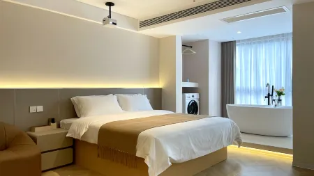 Muguang Meiju Homestay Hotel (Guang'an Wuyue Plaza) Отели в г. Гуанан