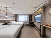 Mo Shang Qing Ju Hotel (Quliang Garment Industrial Park, South University Road, Zhengzhou) Hotel di Xinmi