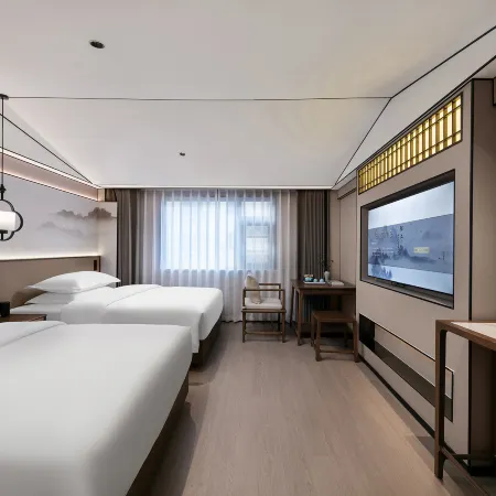 Mo Shang Qing Ju Hotel (Quliang Garment Industrial Park, South University Road, Zhengzhou)