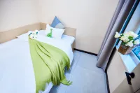 Kuxiong Homestay Square (Weihai Hanle Square Night Market Store)