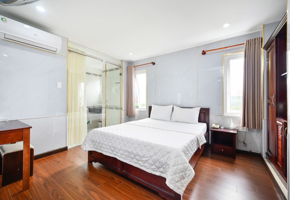 지아 호아 호텔 호치민 시티의 모던한 객실