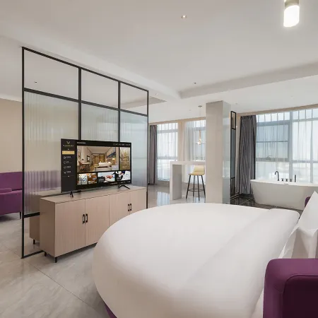 Vienna International Hotel(Zhoukou Wanguo Car World Store)