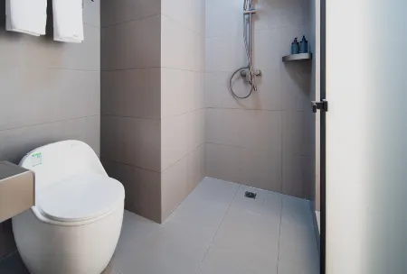 Xindeyuan Hotel Отели рядом с достопримечательностью «Qingdao Institute of Technology»