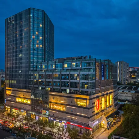 Guike Hotel (Shanghai 80,000 Stadium Caobaolu Subway Station Branch) Отели рядом с достопримечательностью «Храм и пагода Лонхуа»