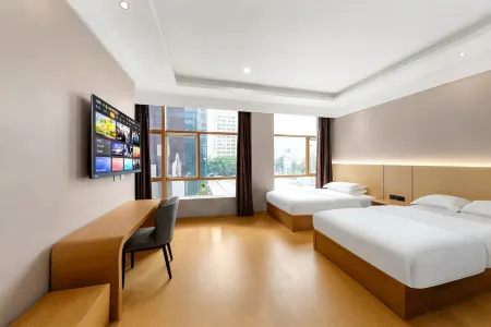 Qiju Hotel (Babaiban Golden Eagle Shopping Center) Отели рядом с достопримечательностью «Tangligong Qinglian Temple»