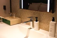 青桔·設計師飯店（延吉延邊大學水上市場店） 五鳳村水稻觀光連廊附近的飯店