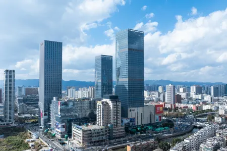 G Five Shang Hotel Отели рядом с достопримечательностью «Kunming University of Science and Technology Department of Packaging Engineering»