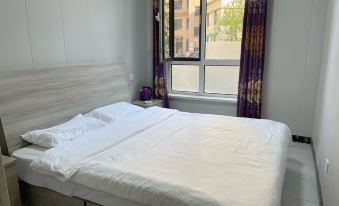 Weilian Xinjia Homestay Hotel (Development Zone Wanda Plaza)