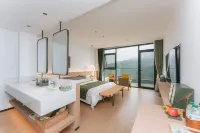 Yinju Xiangli Qingmugua Zhi Wei Vacation Apartment