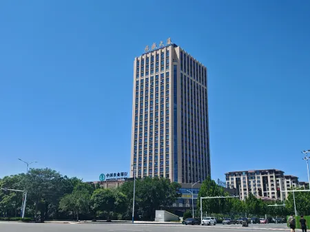 THE HOME HOTEL Отели рядом с достопримечательностью «Yantai Nanshan University (Nanshan Middle Road)»