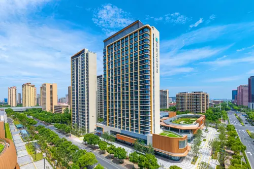 Adoor Suites Songbei Suzhou - خدمة نقل من وإلى المطار