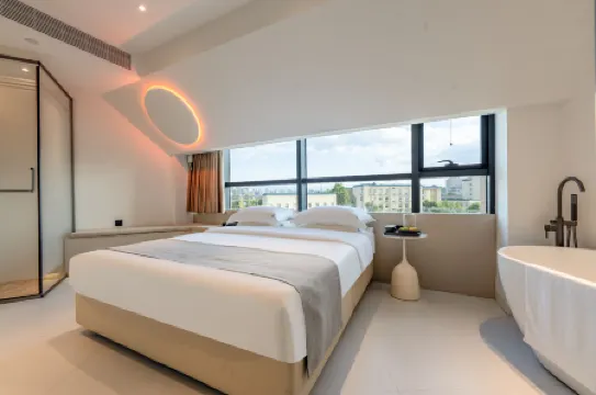 King13 Nest Hotel Отели рядом с достопримечательностью «Vanguard (Xi'an Taihua Road Shop)»
