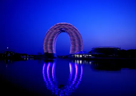 TAI LAKE DREAMLOHAS VILLA RESORT Отели рядом с достопримечательностью «Zhangtianyang Wetland»