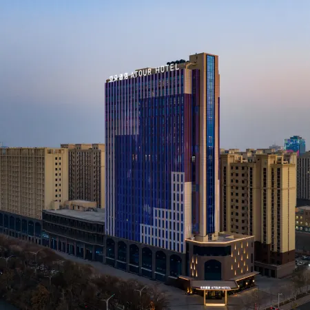 Turpan Guotai Minsheng Plaza Junmin Gongjian Lyuaduo Hotel