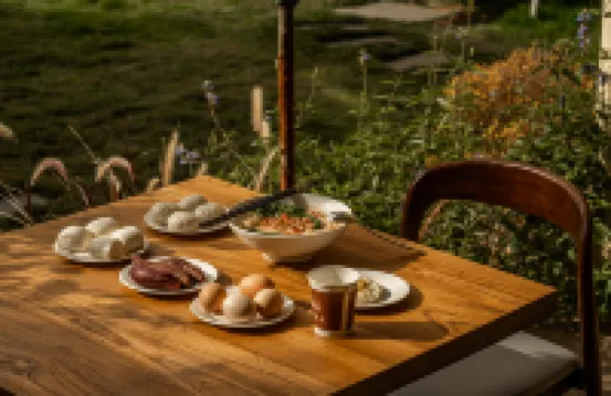 Experience the breathtaking panorama of snow-capped mountains in a luxurious villa.