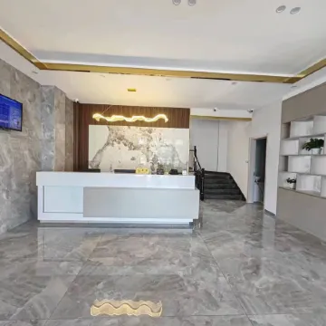 Homeinn Pebble Hotel (Tailai County Zhenxing Road)