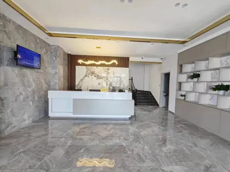 Homeinn Pebble Hotel (Tailai County Zhenxing Road)